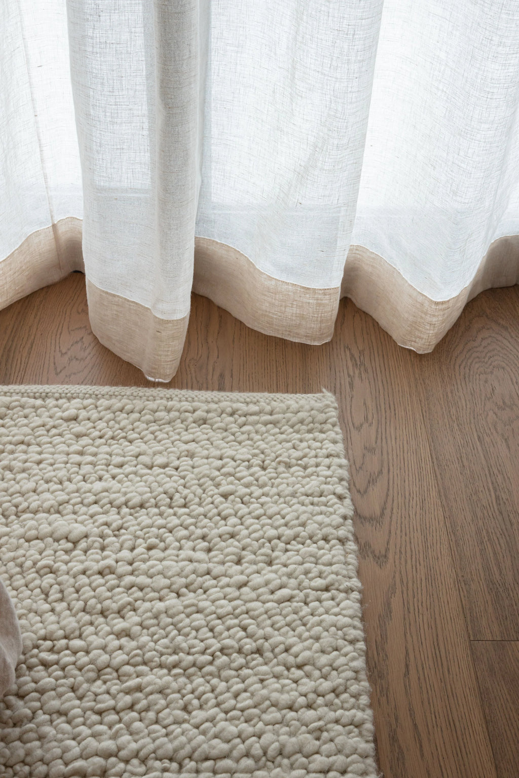 Newport Pebbly Weave Wool Rug in Ivory