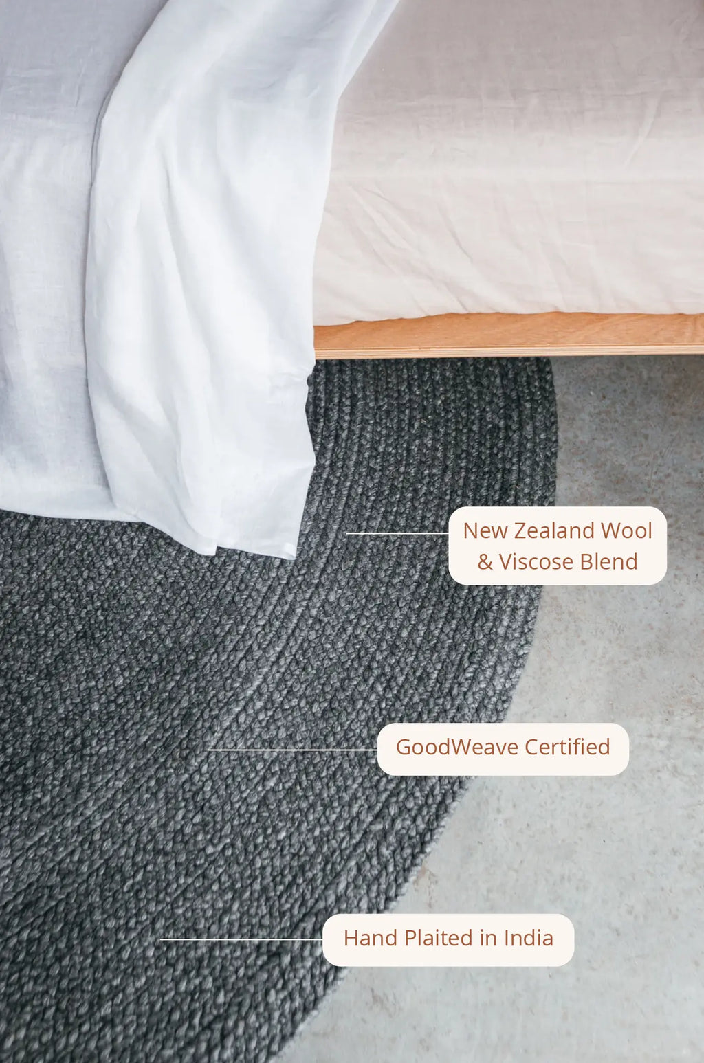 Jiva Round Braided Wool Rug in Charcoal