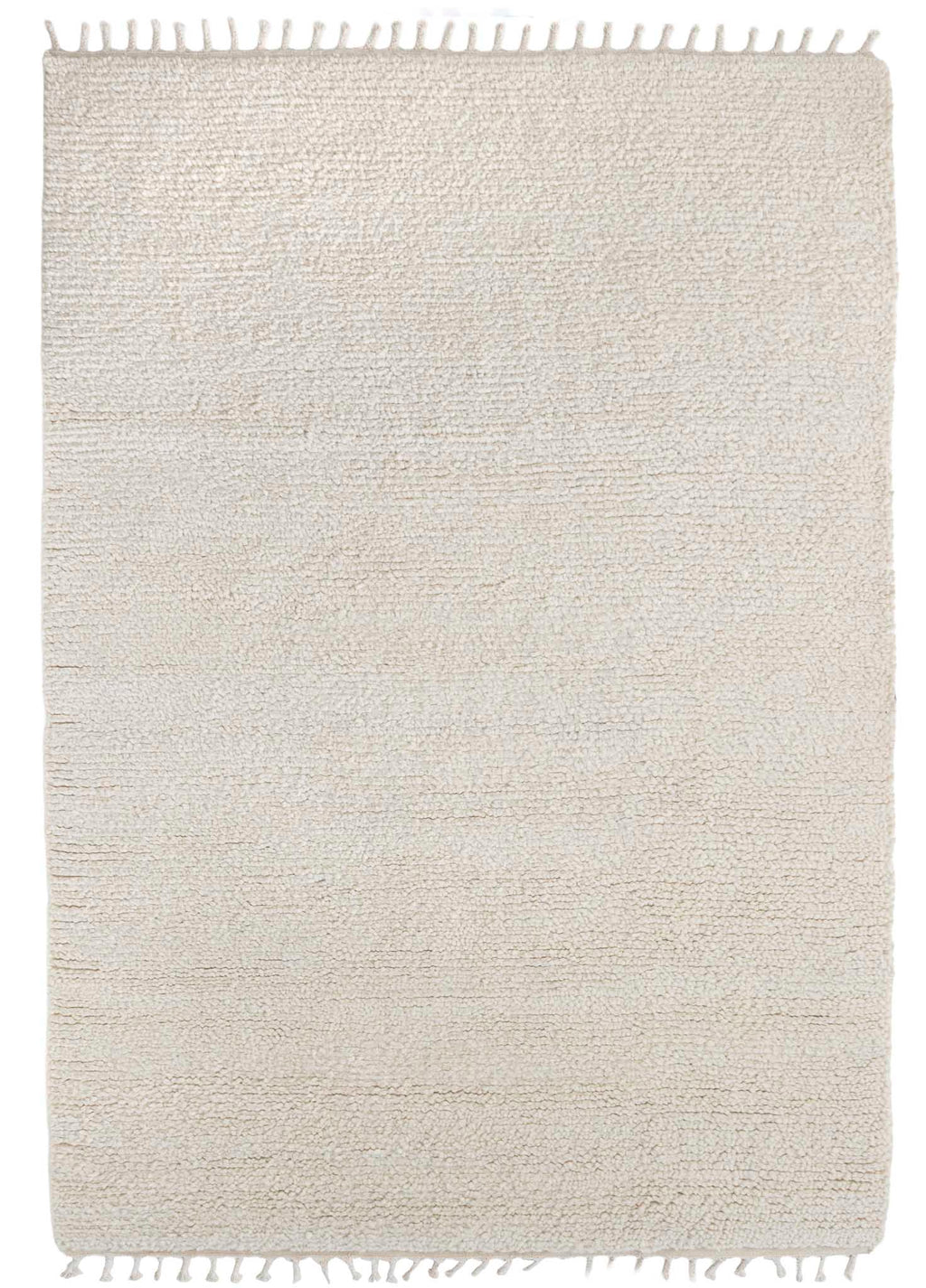 Beige rug with tassels on a white background