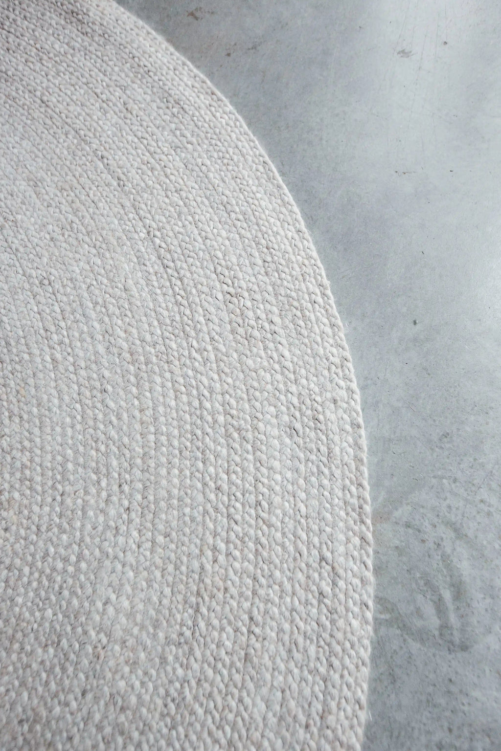 Jiva Round Braided Wool Rug in Ivory Beige