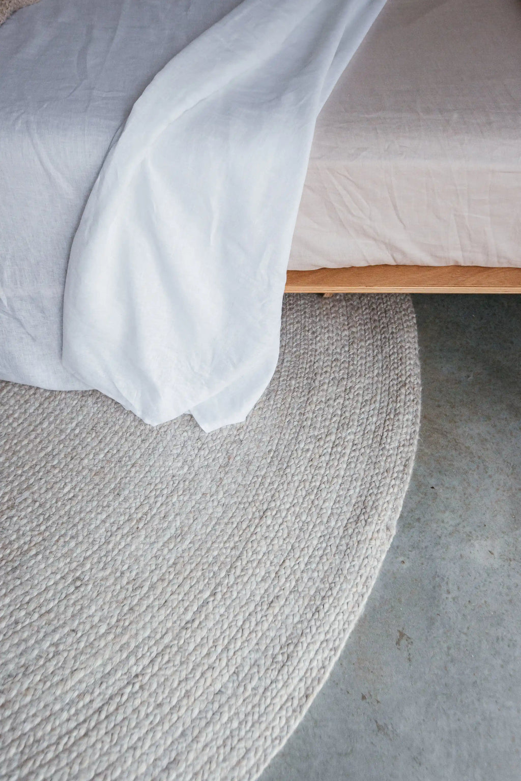 Jiva Round Braided Wool Rug in Ivory Beige